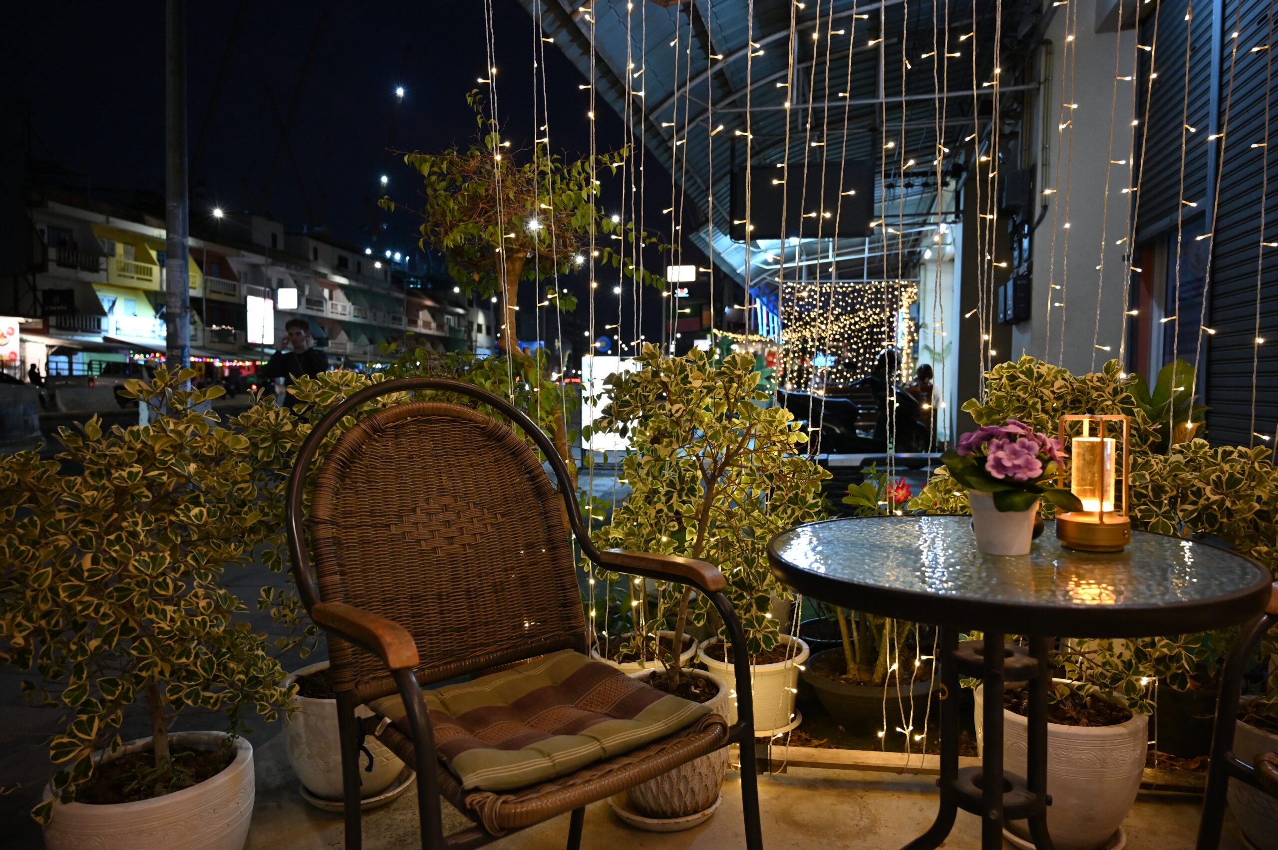apartment balcony decor ideas small space corner with string lights and wicker chair