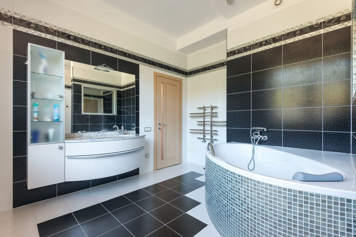 Peel and stick backsplash tiles in a small rental bathroom