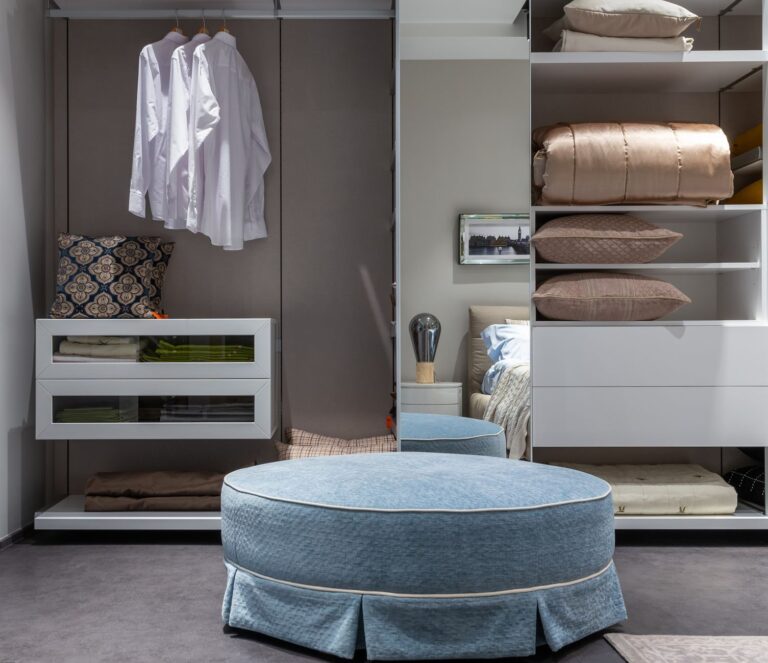Studio apartment storage and organization with open wardrobe